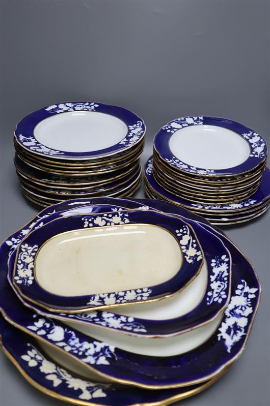 A part-set of eleven Royal Worcester bone china dessert plates, 23.5cm and a Copeland & Garrett bone china part dinner service